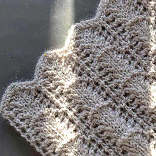 lace knit cowl resembling a pinecone pattern