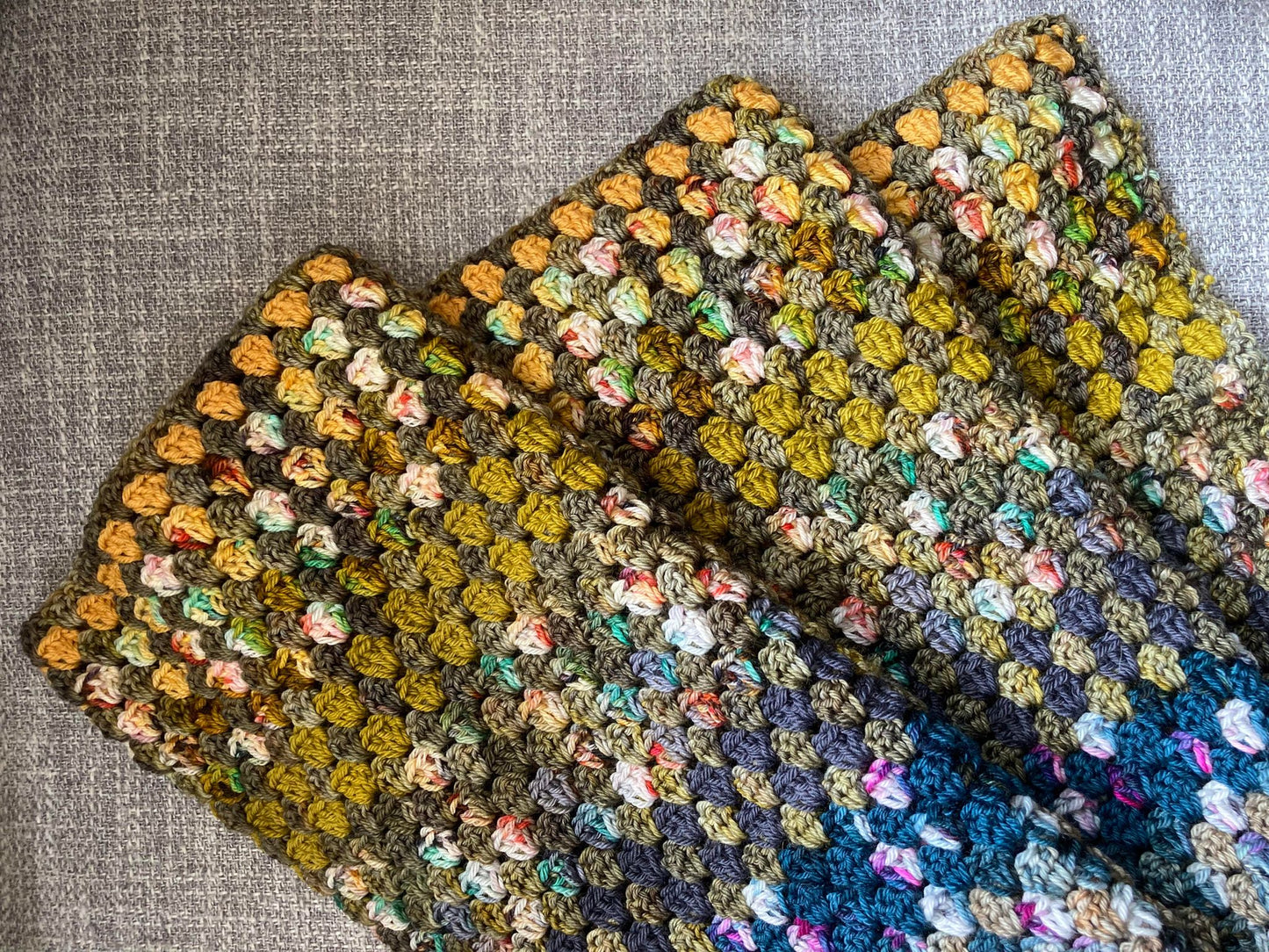 crochet granny stripe blanket using various mini skeins