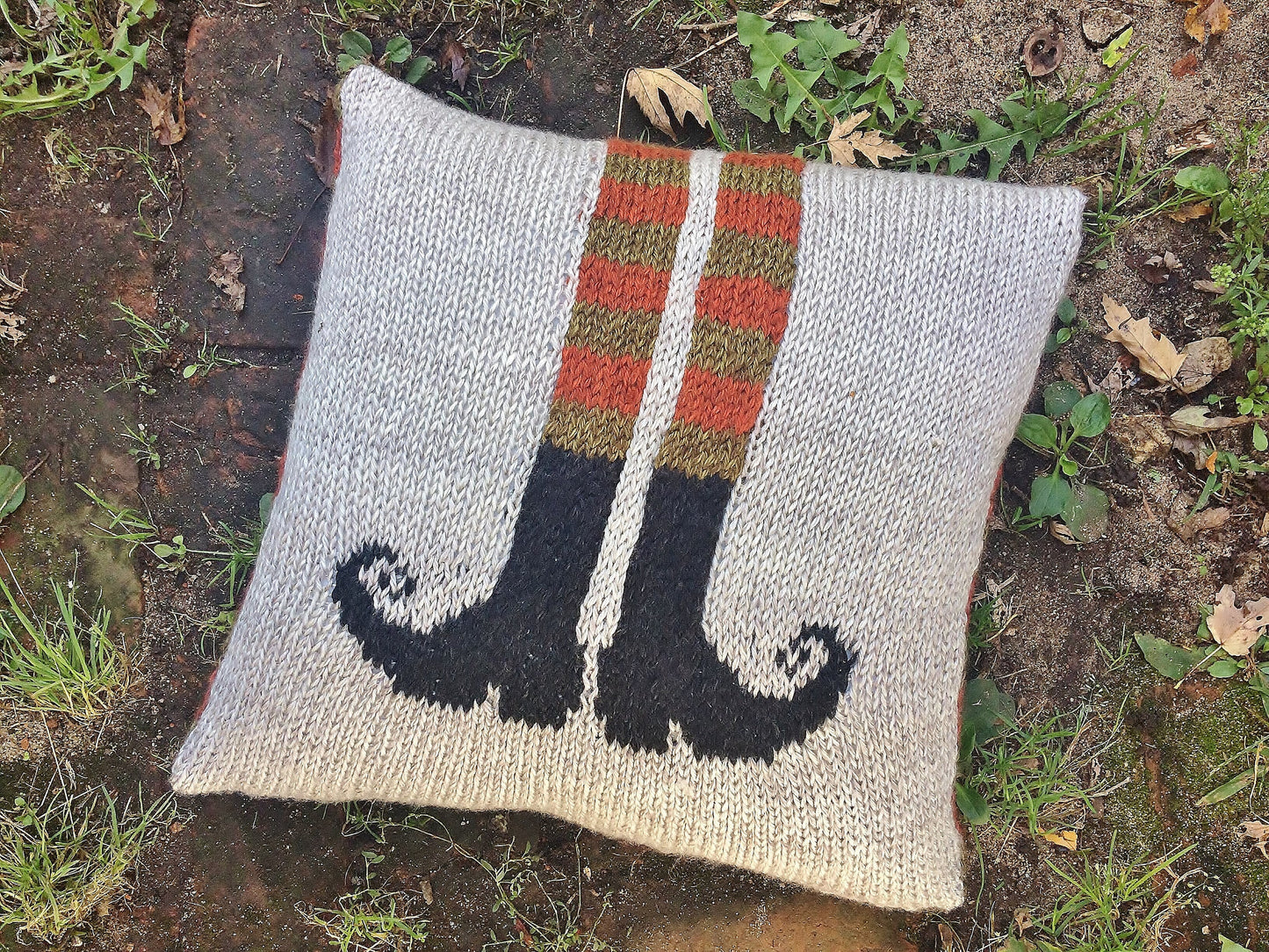 Knit crochet pillow cover with witch legs
