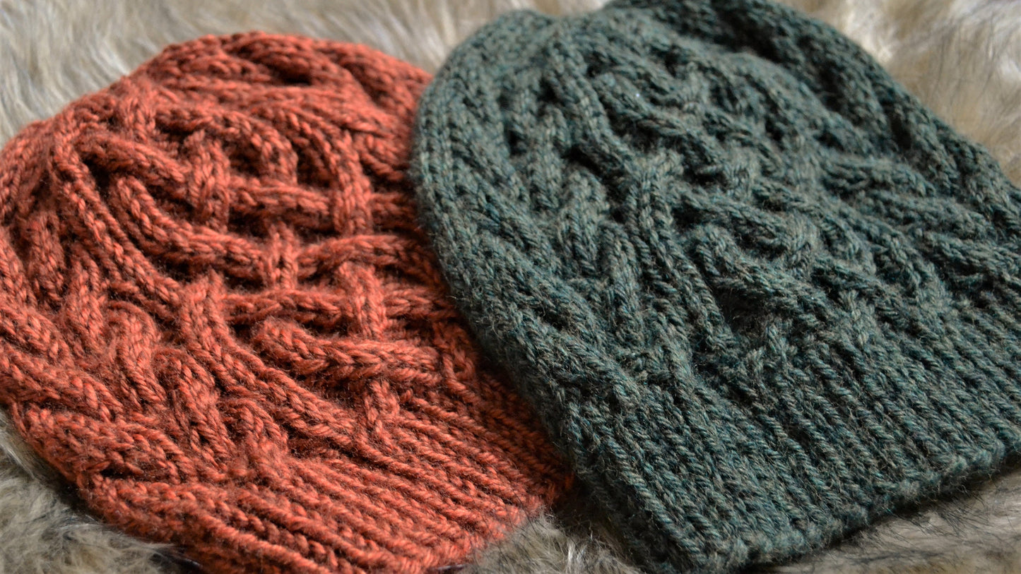 cable knit hat featuring a celtic braid up the middle with braids to each side