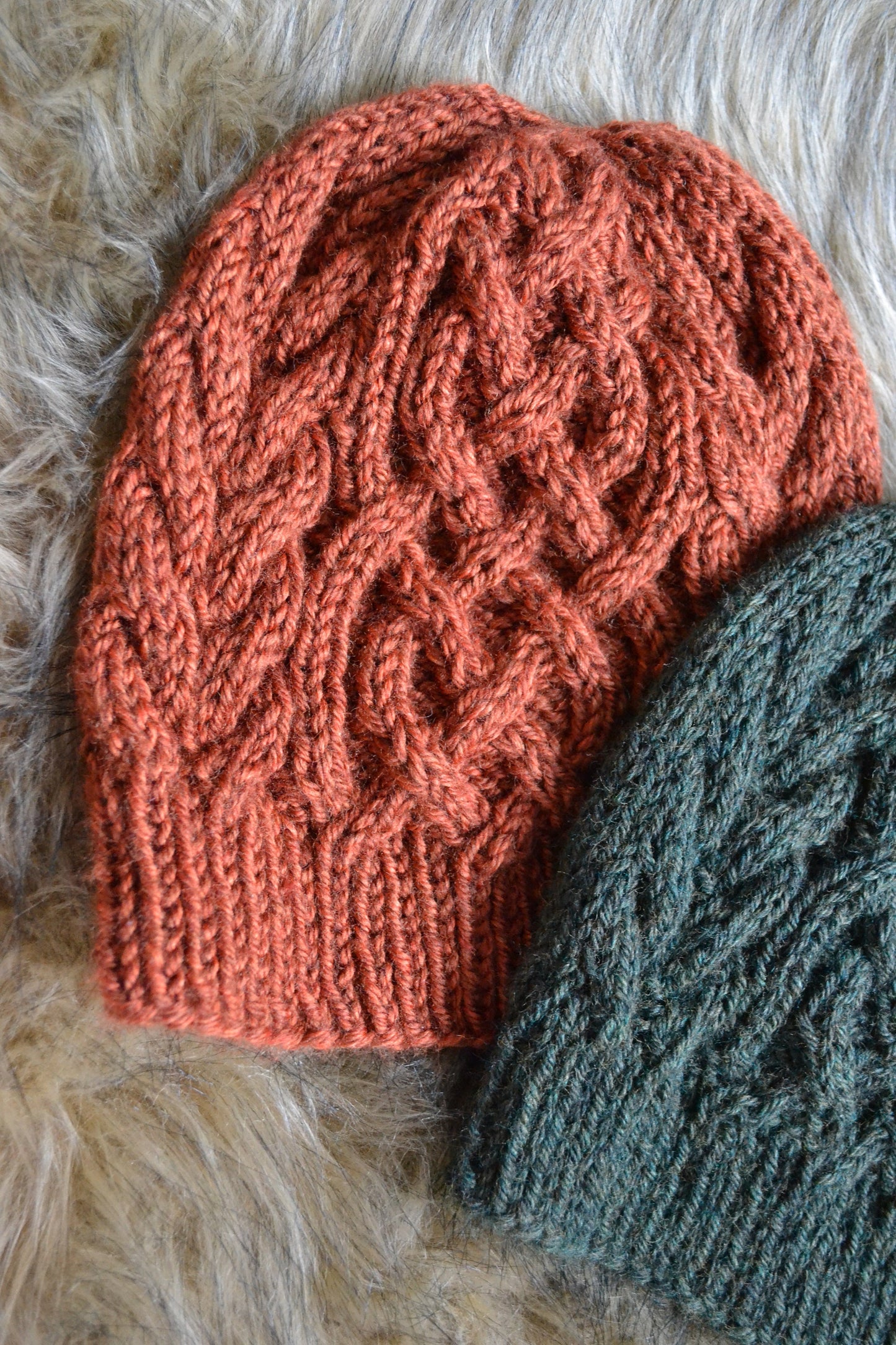cable knit hat featuring a celtic braid up the middle with braids to each side