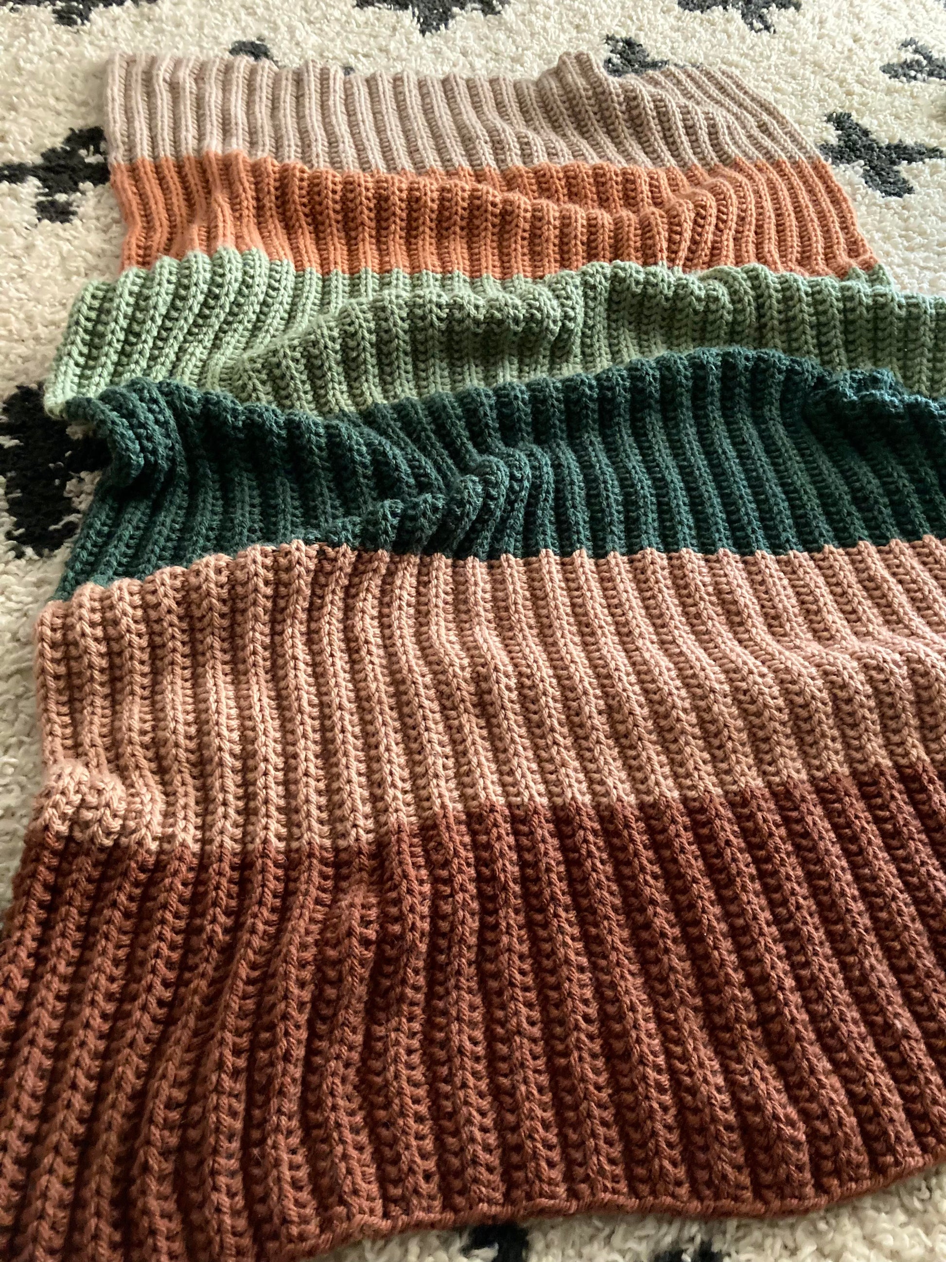 Ribbed knit color block blanket with six colors